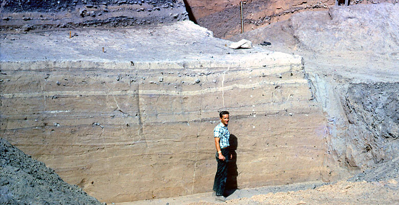 Dave Dibble stands beside a newly exposed profile at Arenosa Shelter in 1966