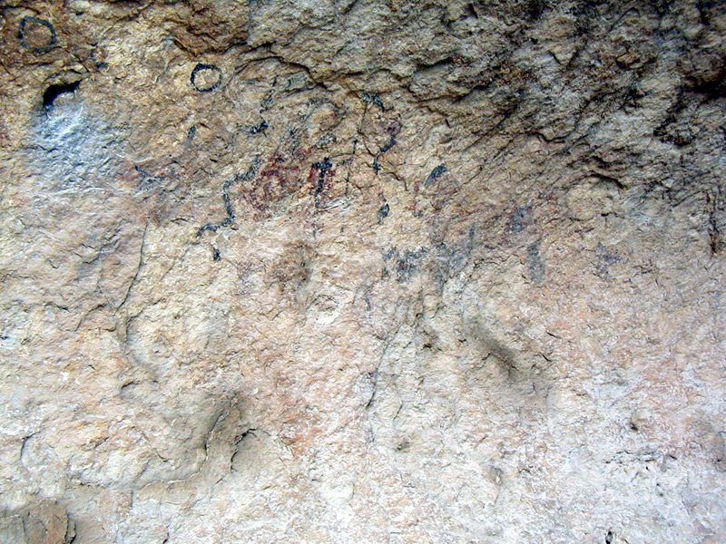 The walls of Eagle Cave were once covered with hundreds of pictographs, most of which were created over 3,500 years ago. Most of these have faded with time or are obscured by the dust kicked up during the 1936 excavations. 