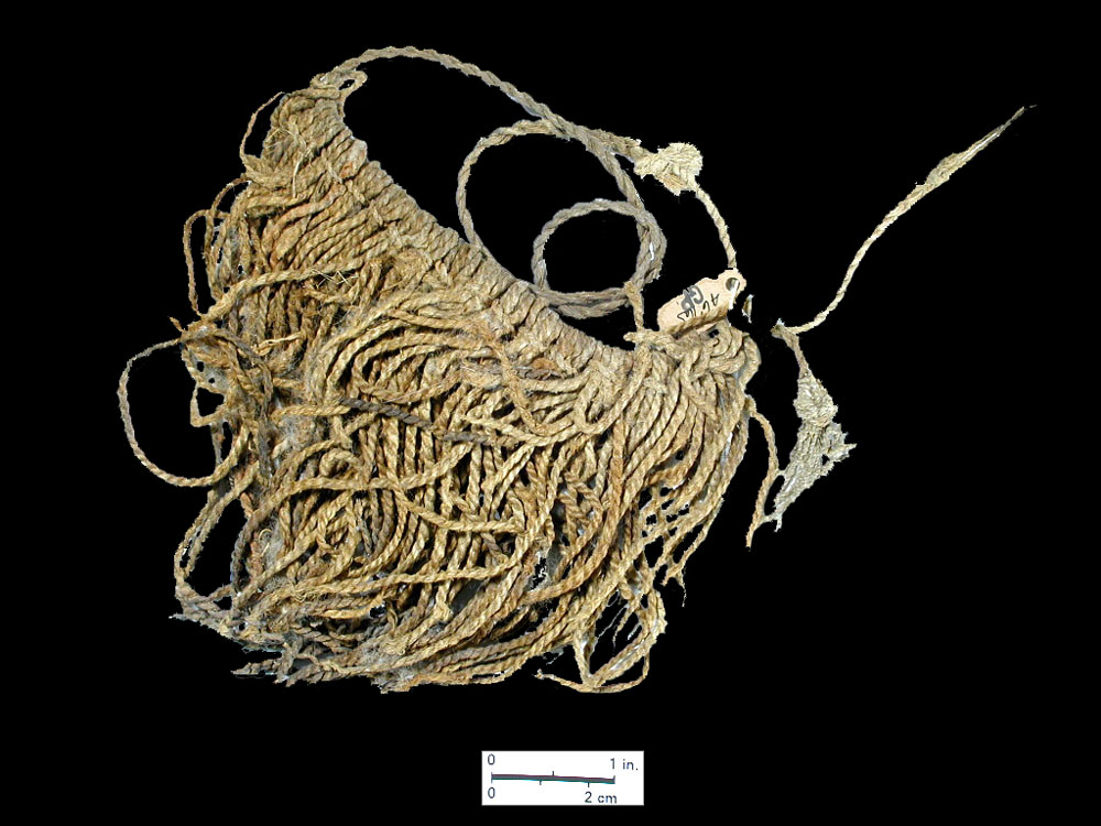 Providing minimum coverage, this "apron" of twined fiber cording was typically worn tied around the waist by women.