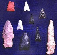 The projectile points found at Firecracker represent raw materials from local sources. The small triangular arrow points were made and used by the pueblo occupants, but several of the larger, side-notched points are dart points from earlier cultures perhaps picked up as curiosity items.