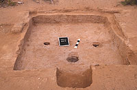 Room 26, a pithouse of moderate depth with a simple step entry, two post holes and a hearth. Pottery making tools and an unfinished clay bowl were found on the floor of this room, suggesting that the potter had intended to return.