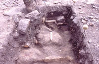 Close-up view of trench dug through midden area. Photo by Gene Schaffner.