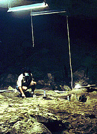 photo of archeologists in the cave