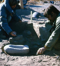photo of the excavation of one of the basin metates