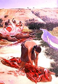 A woman cuts strips of mammoth (Ice-Age elephant) meat on a hide, perhaps to be carried elsewhere for dinner. In the background, the beast is being carved up. 