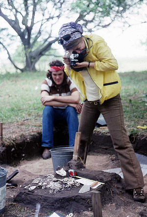 Image of Barbara Atkins photographing an oyster shell concentration.