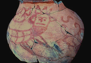 photo of a decorated brownware jar recovered from the Old Socorro Mission