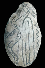 Painted pebbles such as this one are common in the Lower Pecos region but are also known from south and central Texas. They are almost always made on smooth, flat, rounded river pebbles. Although they share some elements in common with pictographs, they are usually less elaborate and painted in black.