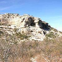 This is small rockshelter is 41VV1—the first formally recorded archeological site in Val Verde County. It is one of hundreds of small shelters that dot the Lower Pecos landscape. Prehistoric peoples found these protected places useful for many different purposes. This one is too small to have been lived in for long. Photo from ANRA-NPS Archives at TARL.