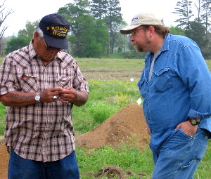 photo of Caddo elder Lyman Kionute and Tribal Historic Preservation Officer Robert Cast at the Pine Tree Mound site in 2006.