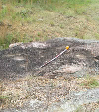 used granite outcrop with mortars, metates and an anvil