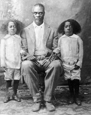 photo of S. M. Sorrells with twin sons, Alvin and Virgil, date unknown