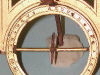 Close up of the universial equinocital sundial. It was half of a two-part navigational instrument. The missing part is the compass upon which the sundial sat. 