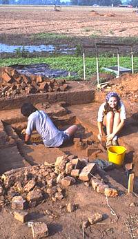 students excavating