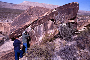 photo of El Paso Archaeological Society members photographing rock-art