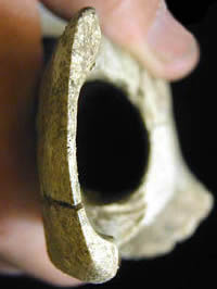 photo of end view of bison tibia tool