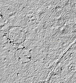 a grey shaded map showing textured terrain, circles, and lines