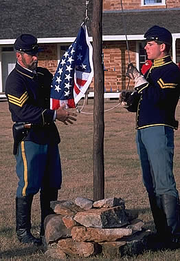 photo of soldiers raising the flag