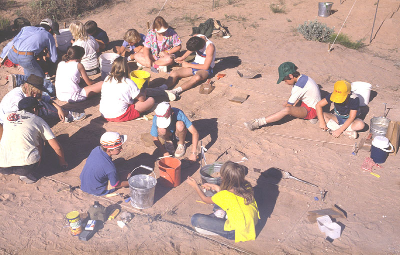 photograph of kids excavating in the desert